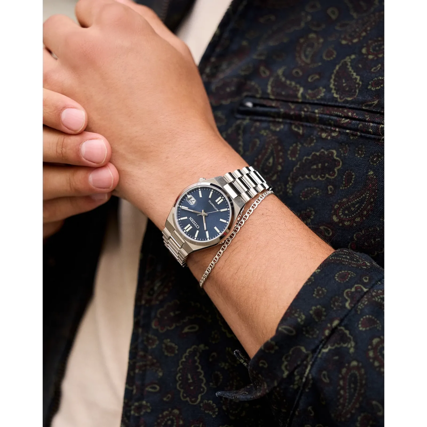 Citizen TSUYOSA NJ0200-50M – 37mm stainless steel case, sunray blue dial, automatic Caliber 8210 movement, sapphire crystal, stainless steel bracelet, and 50m water resistance.