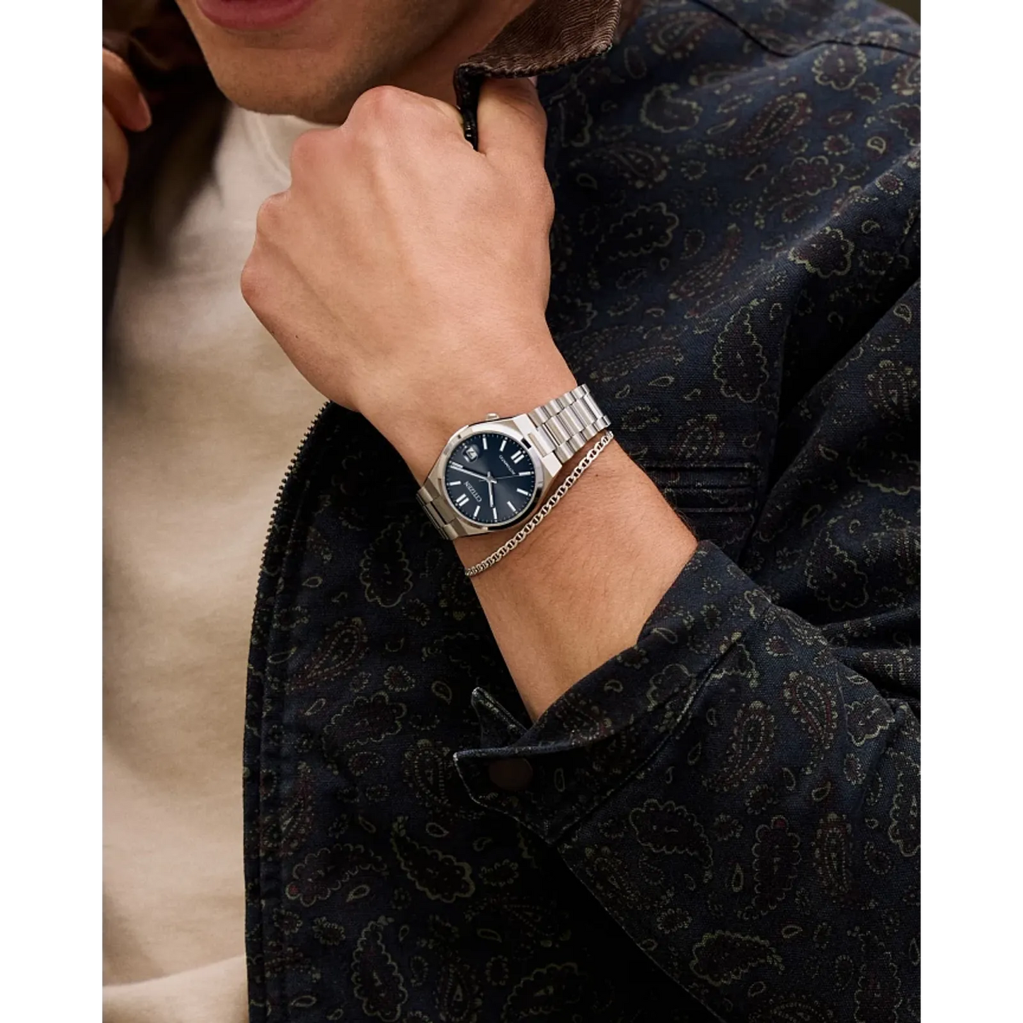 Citizen TSUYOSA NJ0200-50M – 37mm stainless steel case, sunray blue dial, automatic Caliber 8210 movement, sapphire crystal, stainless steel bracelet, and 50m water resistance.
