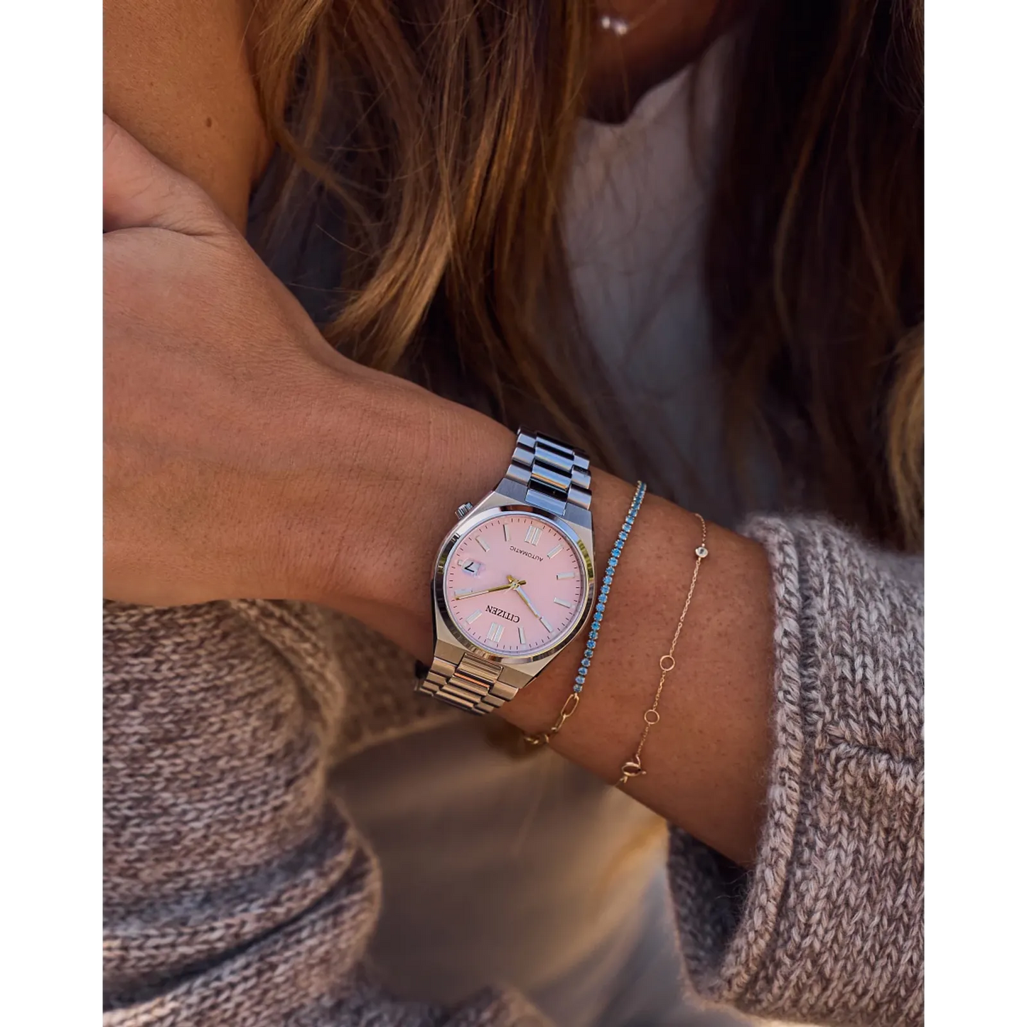itizen TSUYOSA NJ0200-50Z – 37mm stainless steel case, pastel pink sunray dial, automatic Caliber 8210 movement, sapphire crystal, stainless steel bracelet, and 50m water resistance.