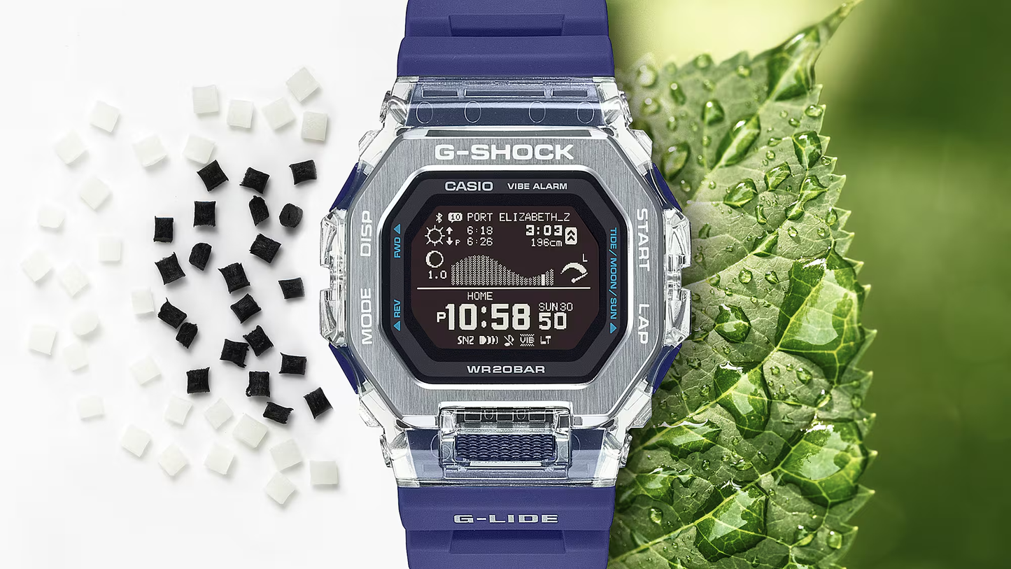 G-Shock digital watch with blue strap on a green leaf background