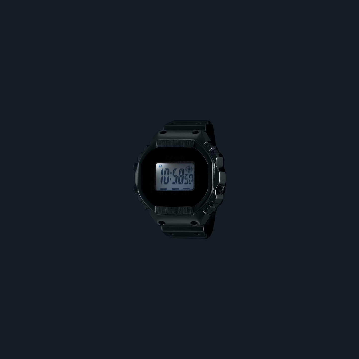 Black digital watch on a black background