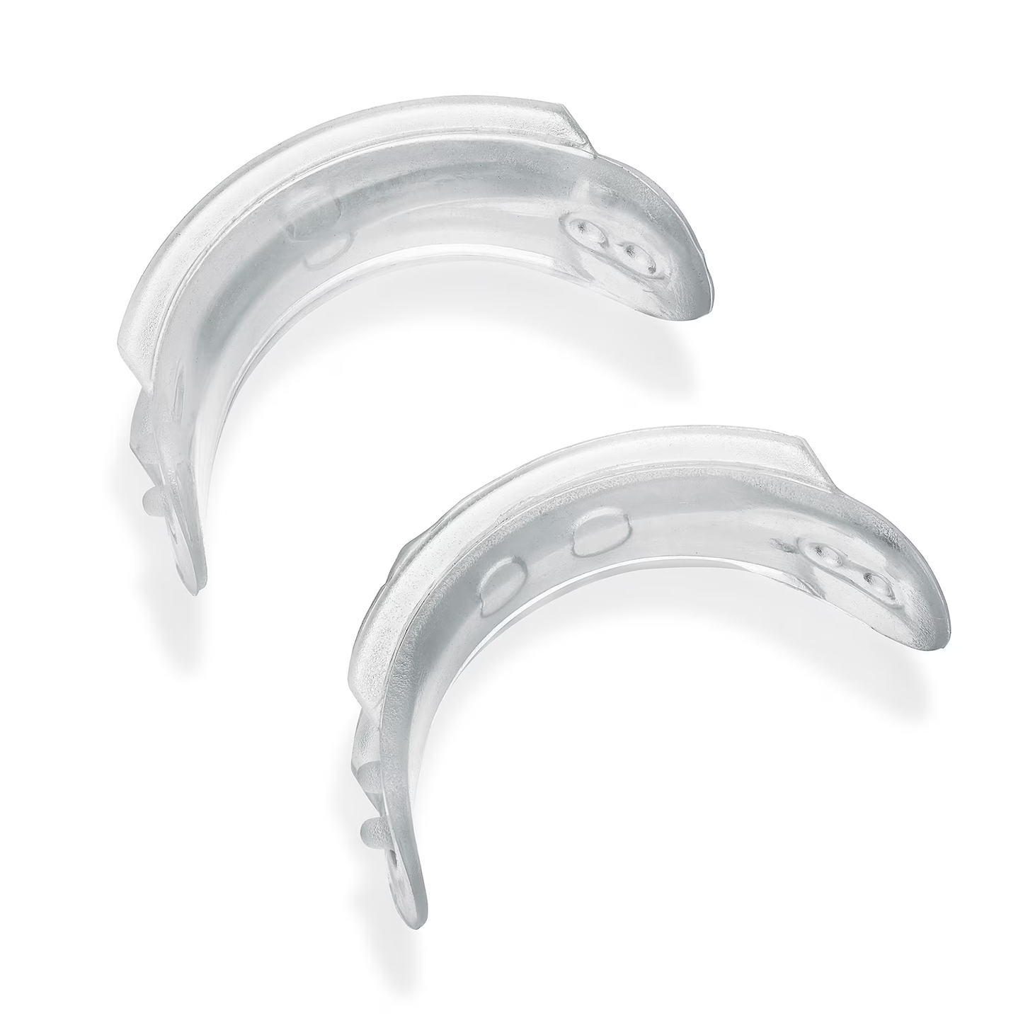 Two clear dental retainers on a white background