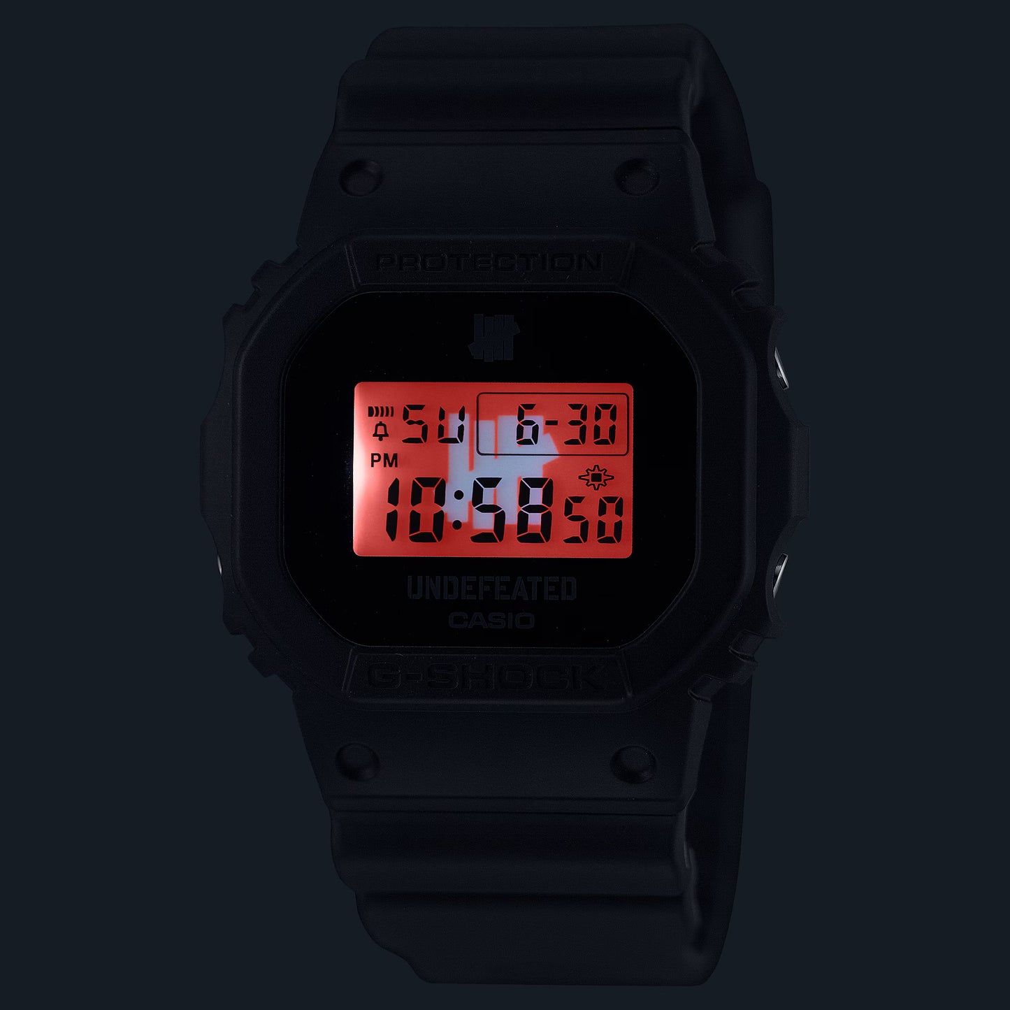 Black digital watch with red display on a black background