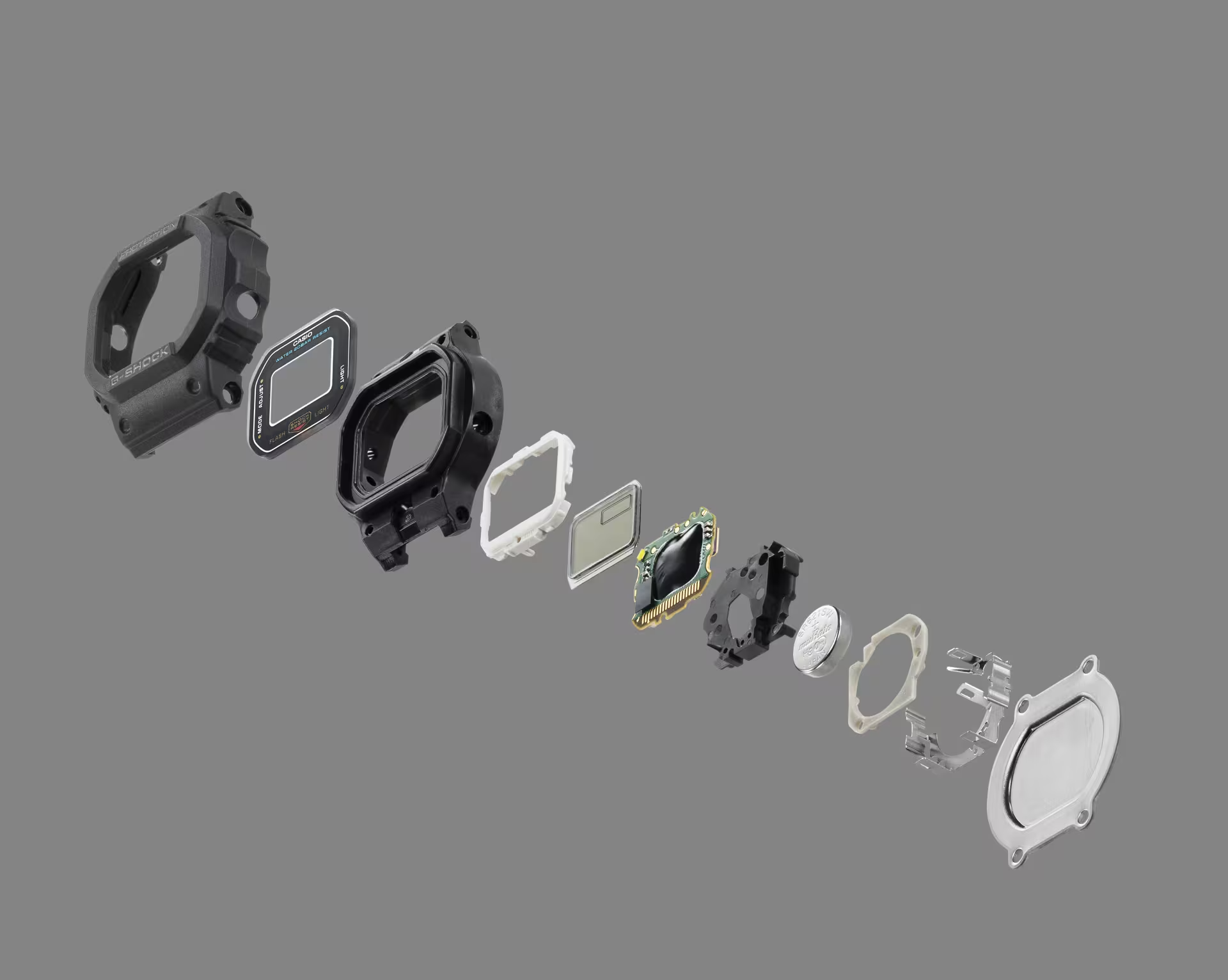 Collection of mechanical parts on a gray background