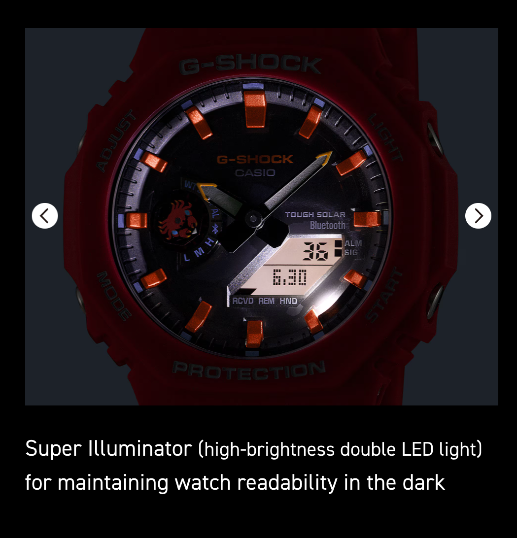 Red Casio G-Shock watch with digital and analog display on a dark background
