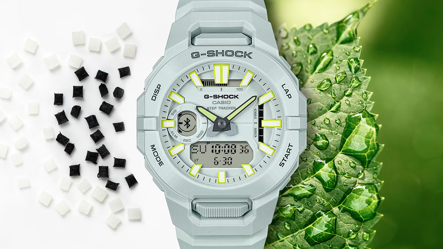G-Shock watch with digital and analog display on a green leaf background