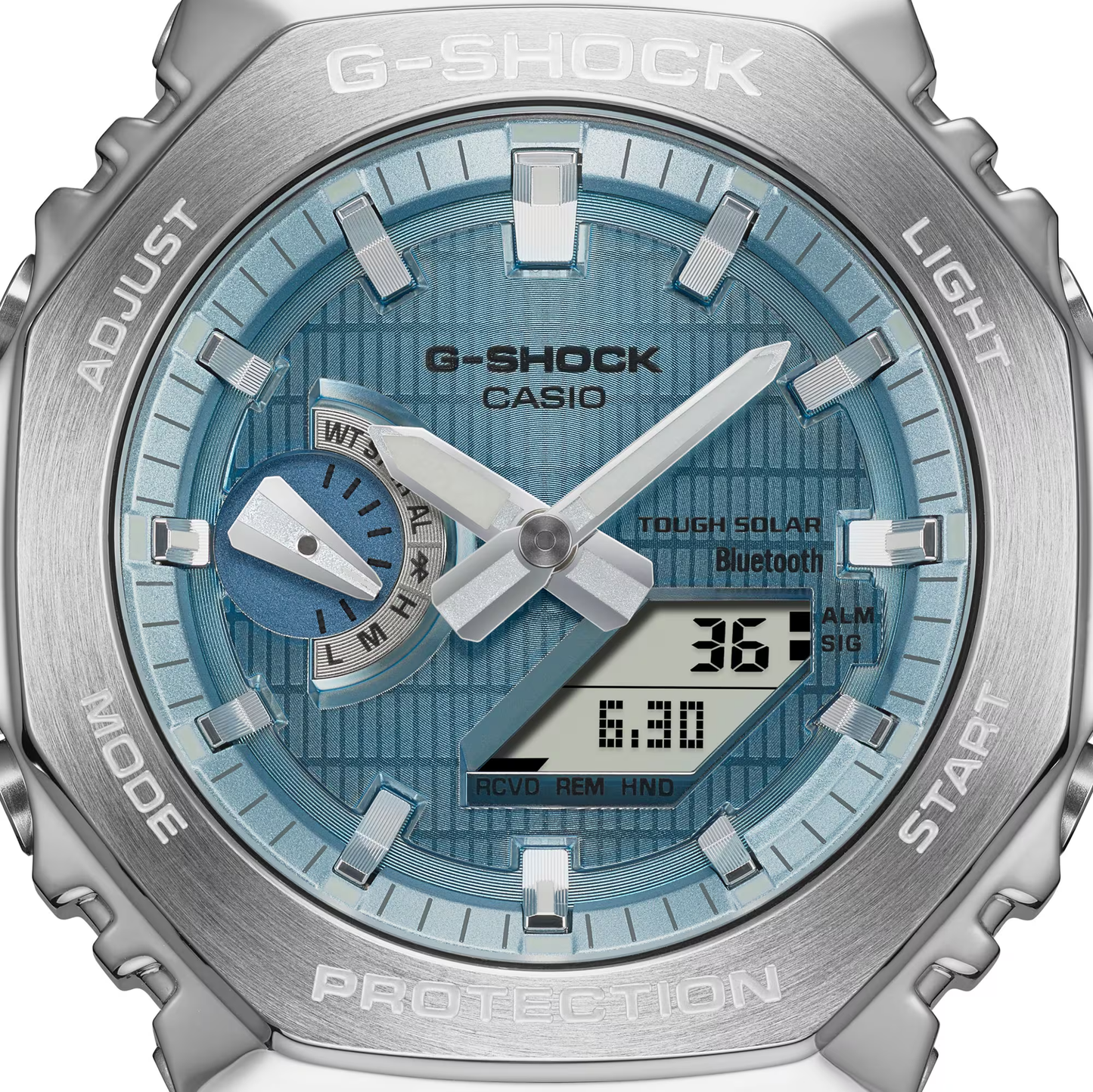 G-Shock Casio watch with silver case and blue face on a white background