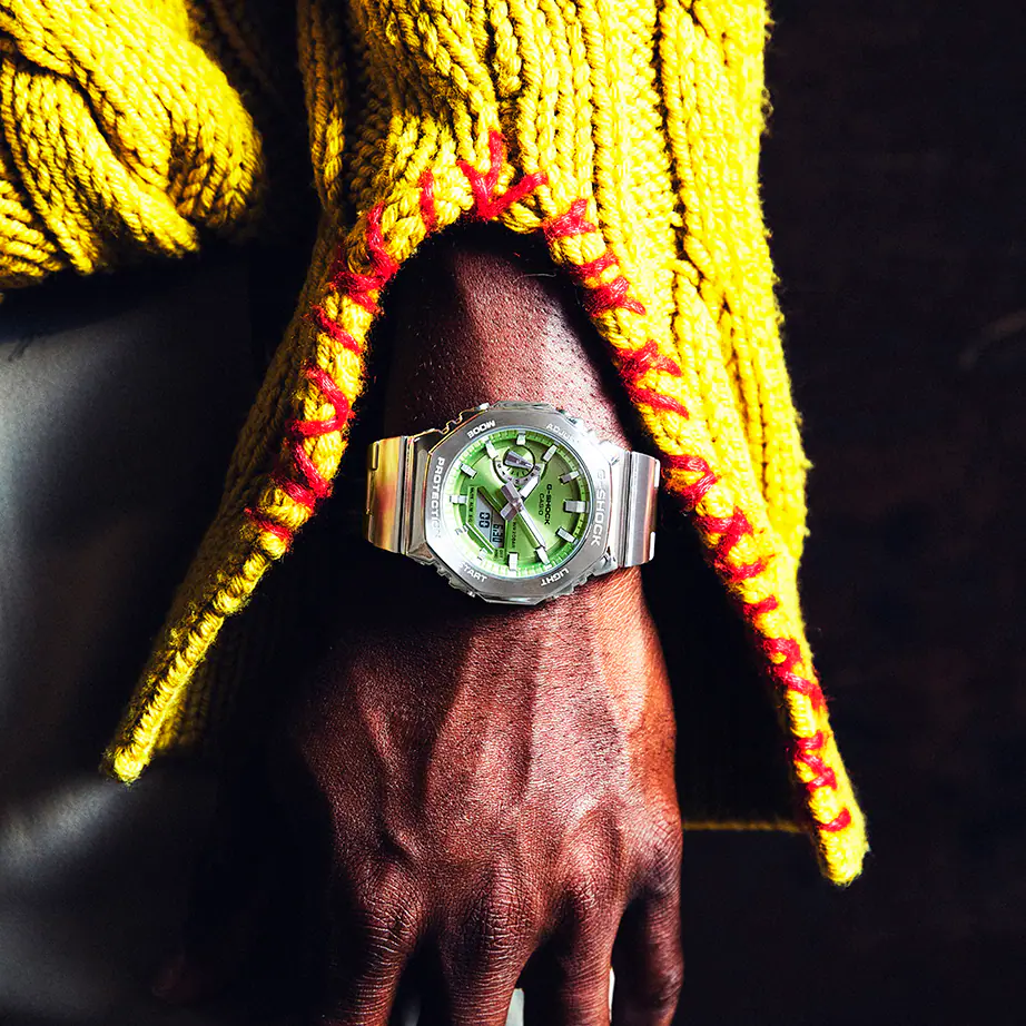 Casio G-STEEL GM2110D-3A, premium stainless-steel G-SHOCK with an octagonal bezel. Features an opal green metallic dial, shock resistance, 200m water resistance, dual LED Super Illuminator, and world time. Stylish and durable.