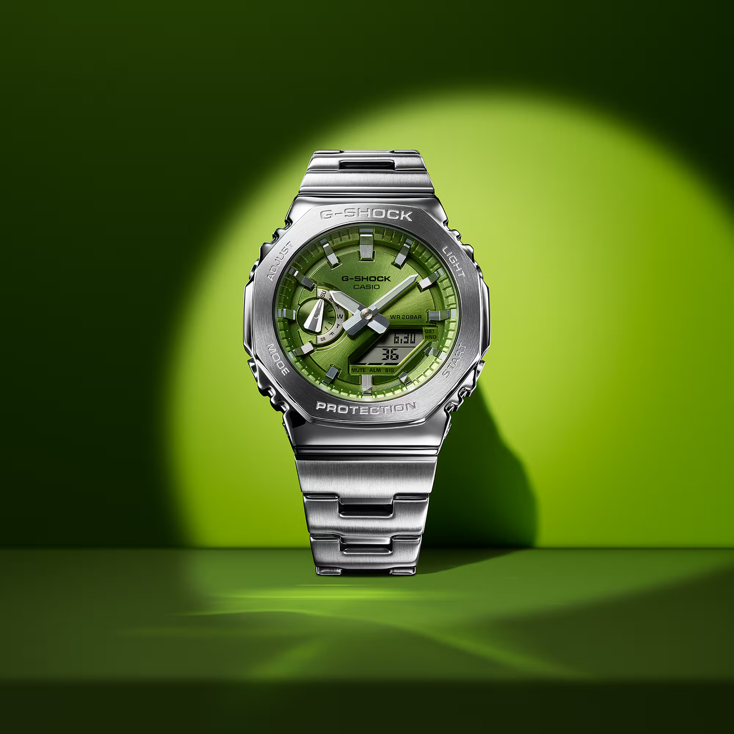 Casio G-STEEL GM2110D-3A, premium stainless-steel G-SHOCK with an octagonal bezel. Features an opal green metallic dial, shock resistance, 200m water resistance, dual LED Super Illuminator, and world time. Stylish and durable.