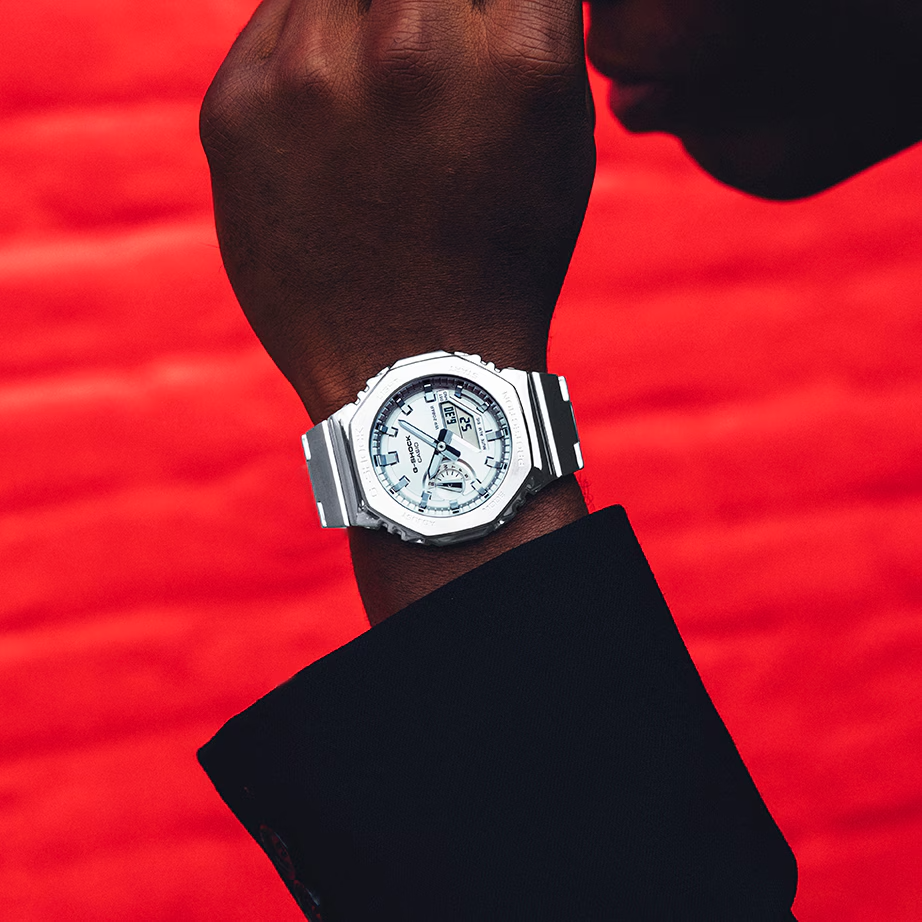 Casio G-STEEL GM2110D-7A, premium stainless-steel G-SHOCK with an octagonal bezel. Features a polished silver-tone dial, shock resistance, 200m water resistance, dual LED Super Illuminator, and world time. Stylish and durable.
