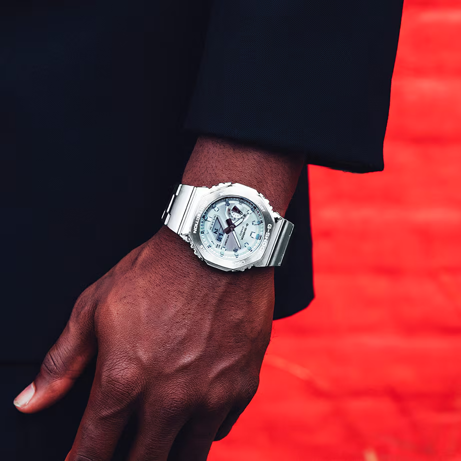 Casio G-STEEL GM2110D-7A, premium stainless-steel G-SHOCK with an octagonal bezel. Features a polished silver-tone dial, shock resistance, 200m water resistance, dual LED Super Illuminator, and world time. Stylish and durable.