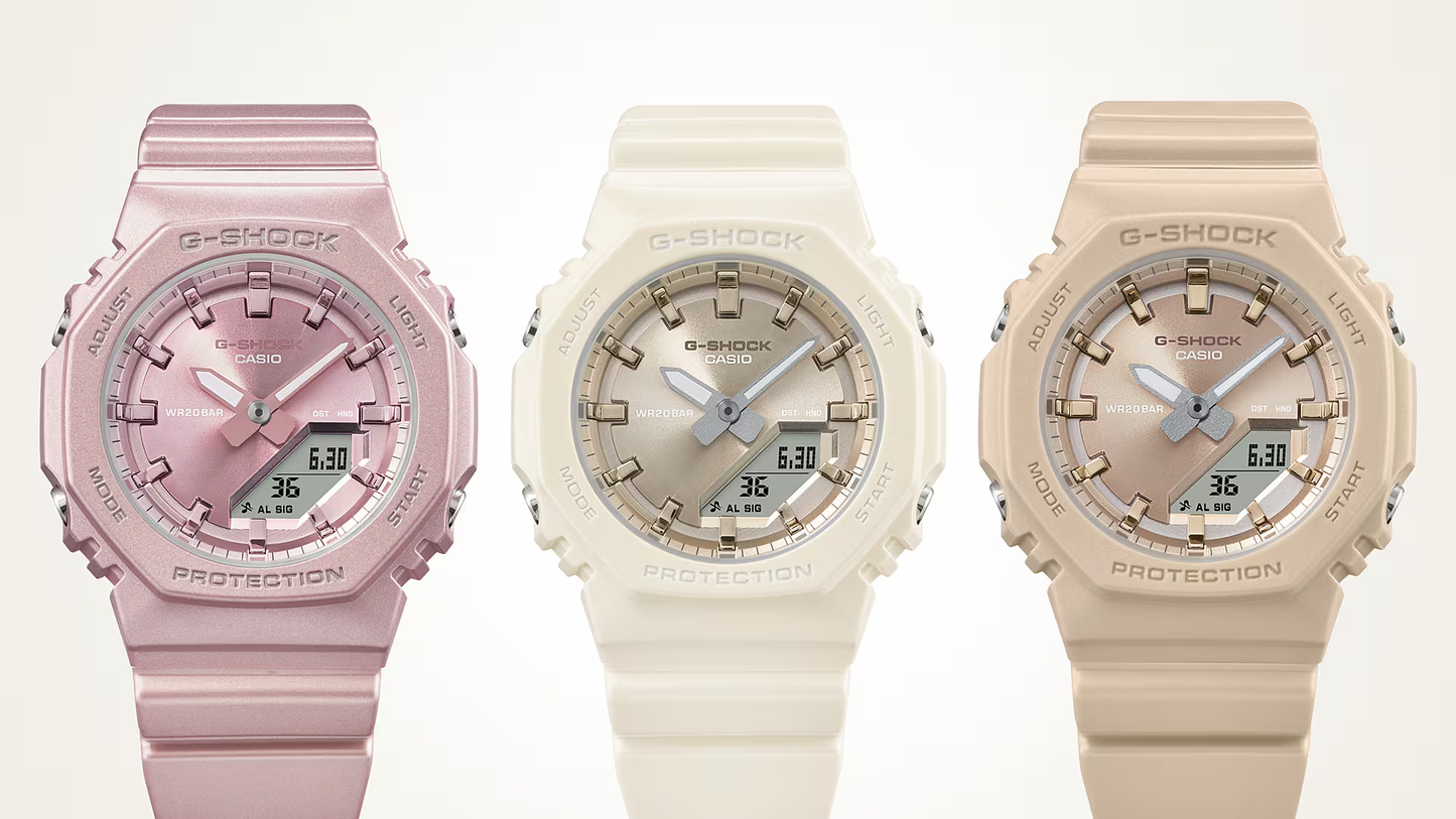 Three G-Shock watches in pink, beige, and white on a white background