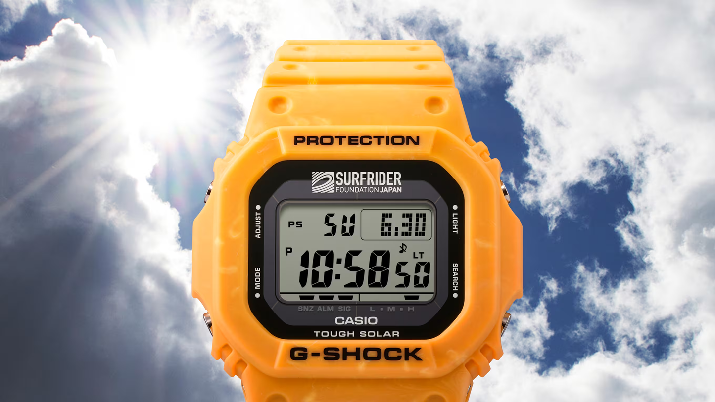 Casio G-SHOCK 5600 Series G5600SFJ-9 – Surfrider Foundation Japan collab in sunrise yellow-beige, bio-based resin, Tough Solar, 200m water resistance, and eco-friendly design.