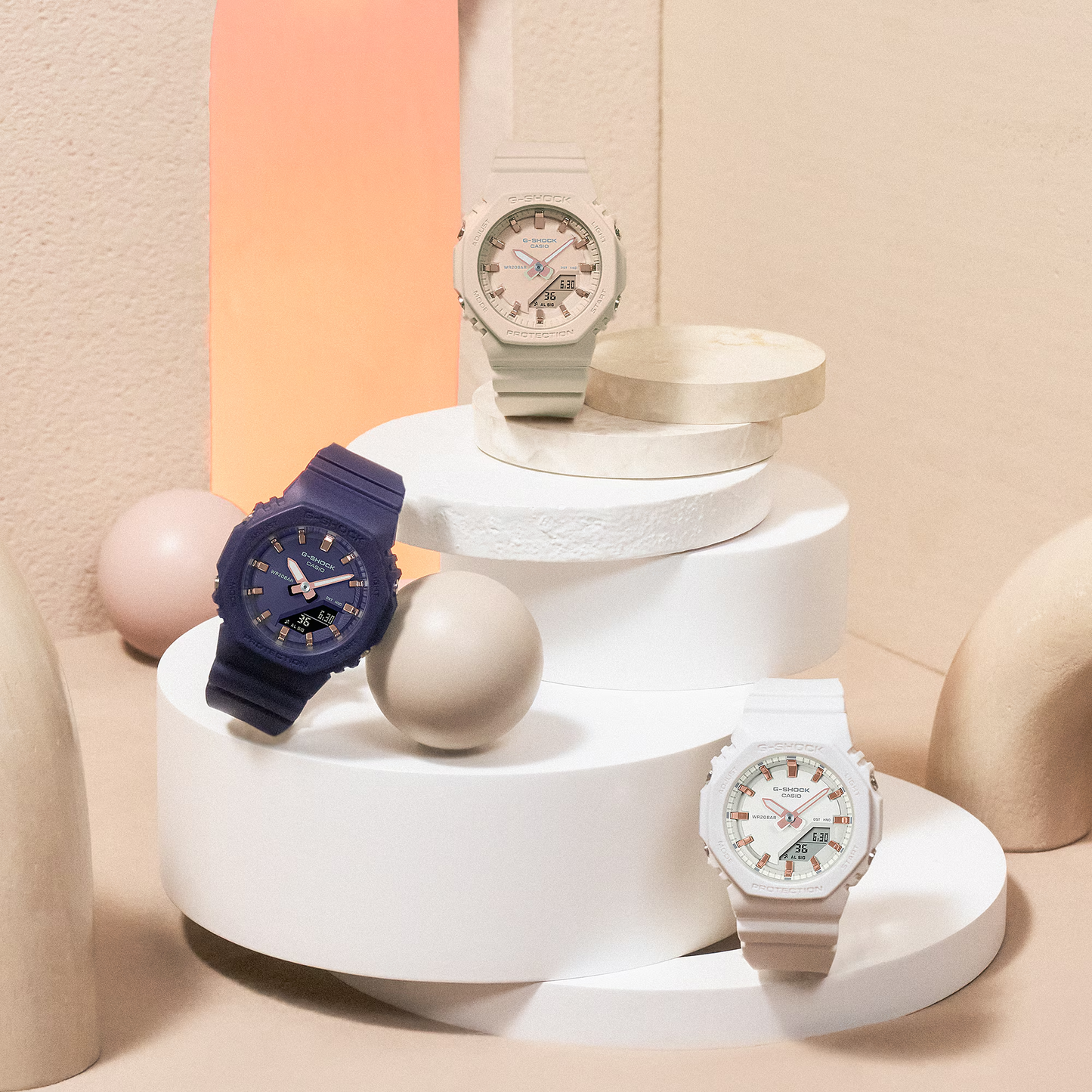 Casio G-SHOCK Women GMAP2100M-4A – blush-pink ‘CasiOak’ with pink-gold accents, compact eco-friendly bio-based resin design, dual LED lights, and 200m water resistance.