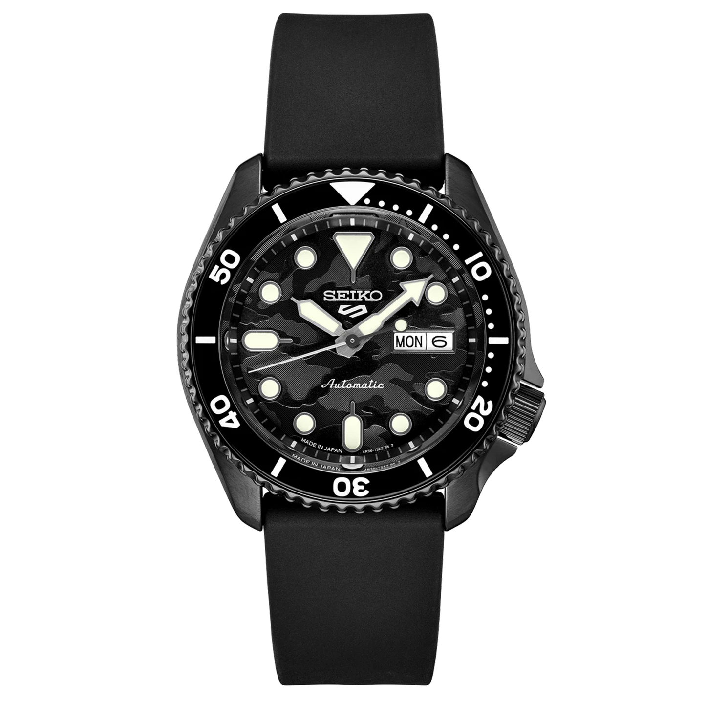 A SEIKO 5 SPORTS SRPJ39 watch with a black camouflage dial, black strap, and black case. The watch has a black uni-directional rotating bezel and displays the day/date calendar.