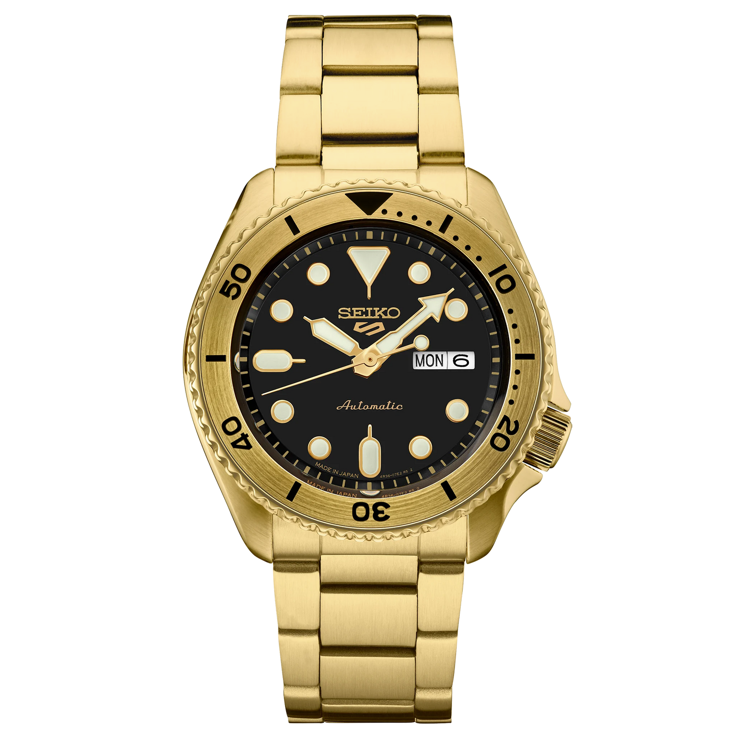 Gold Seiko watch with black dial on a white background