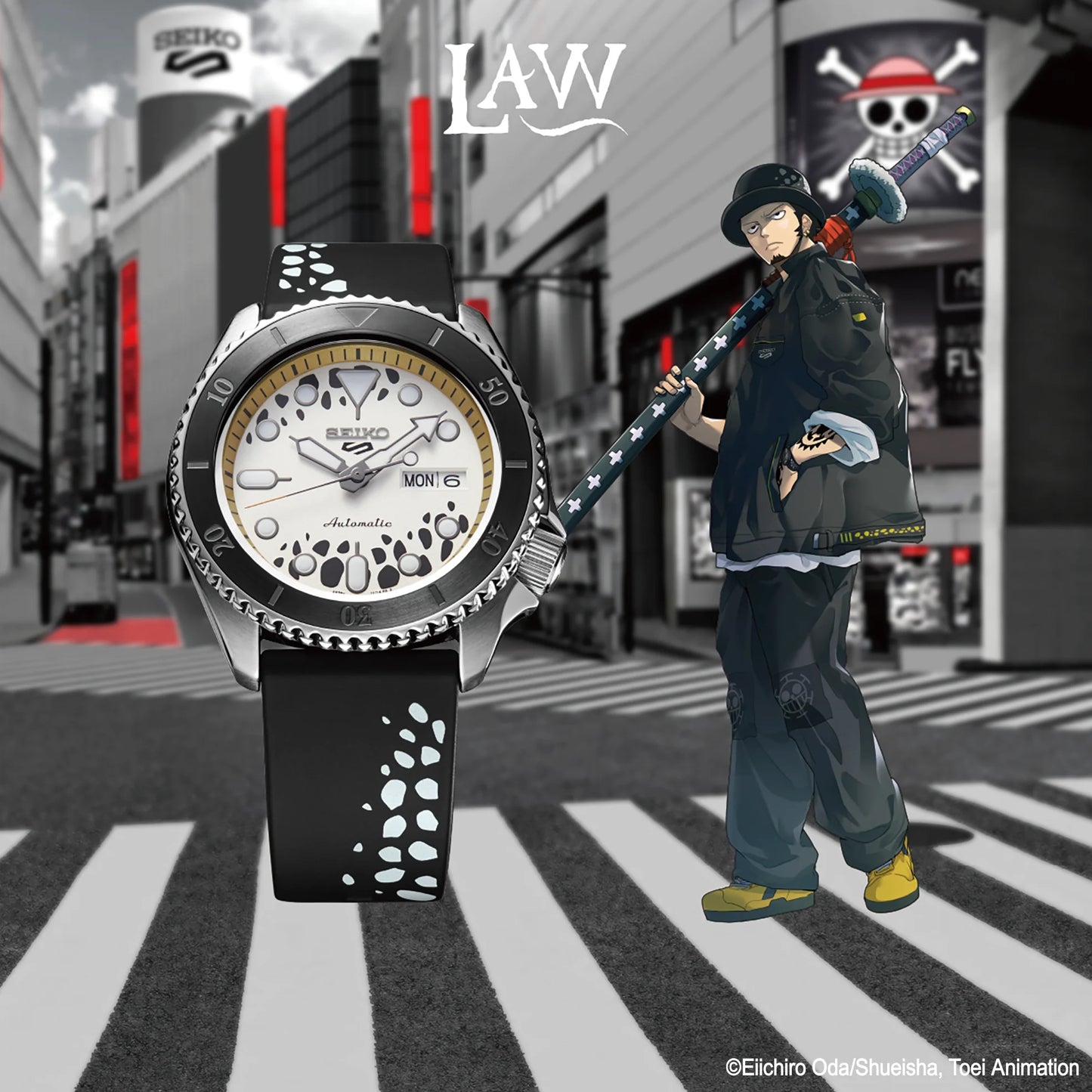 SEIKO 5 Sports One Piece Trafalgar D. Water Law Limited Edition – white and black patterned dial with beige accents, logo caseback, black rotating bezel, automatic movement, and 100m water resistance