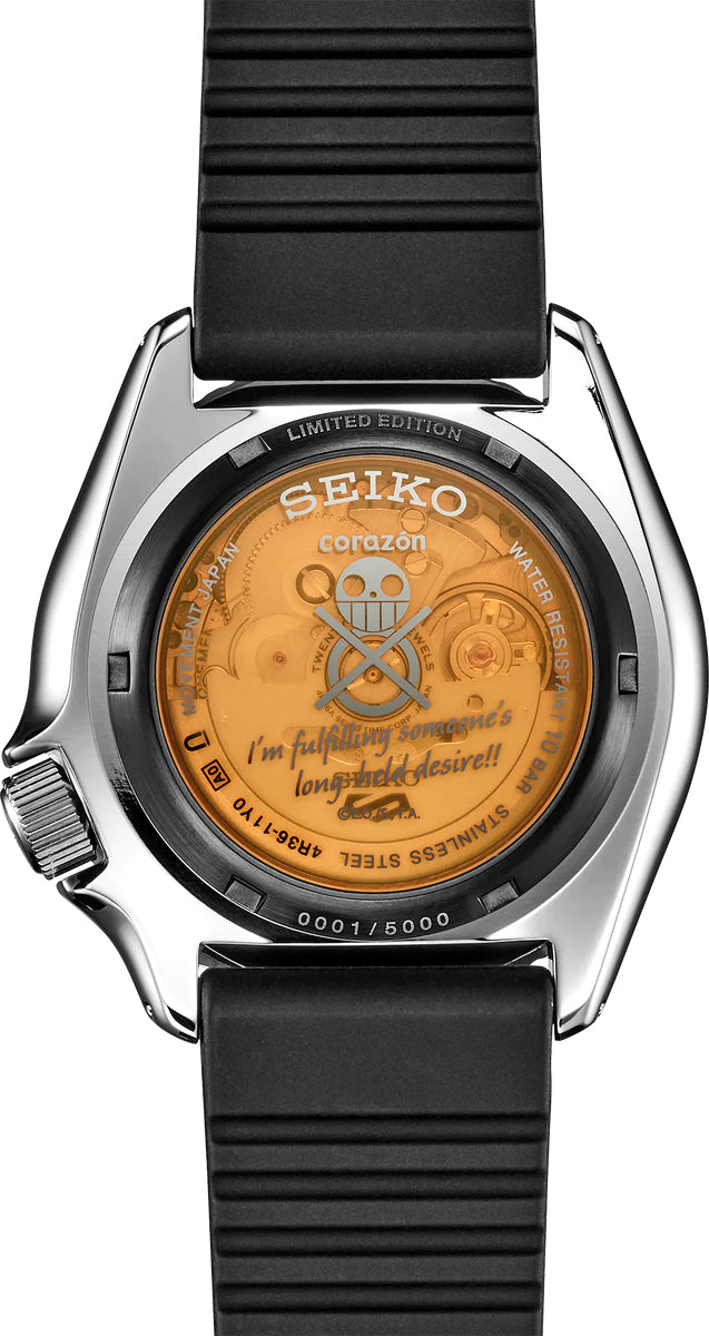 SEIKO 5 Sports One Piece Trafalgar D. Water Law Limited Edition – white and black patterned dial with beige accents, logo caseback, black rotating bezel, automatic movement, and 100m water resistance