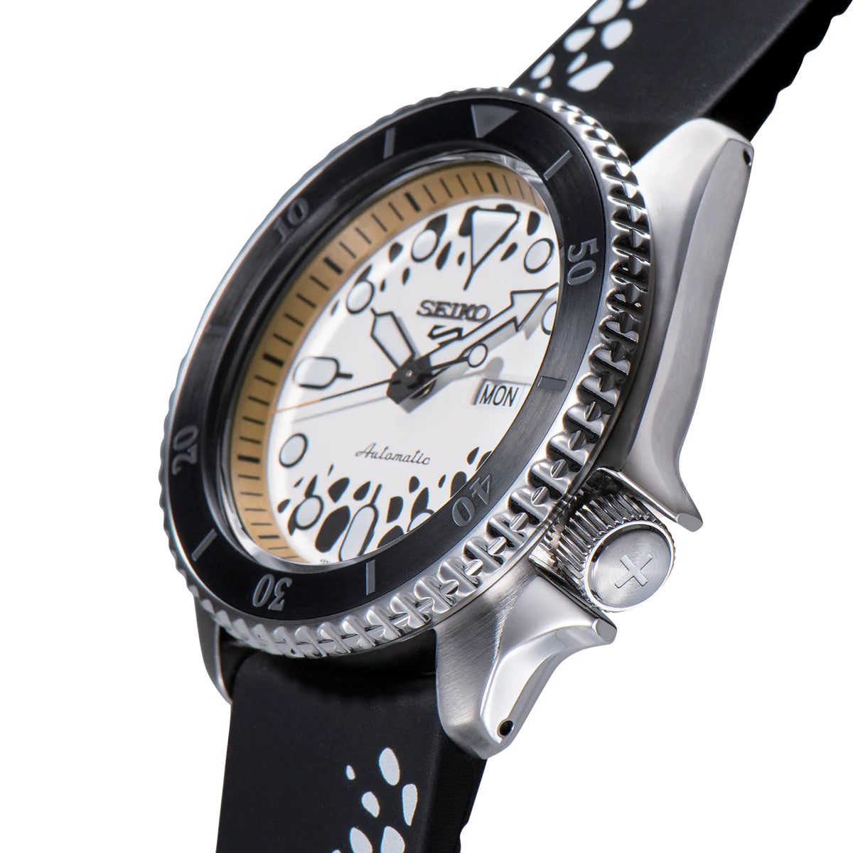 SEIKO 5 Sports One Piece Trafalgar D. Water Law Limited Edition – white and black patterned dial with beige accents, logo caseback, black rotating bezel, automatic movement, and 100m water resistance