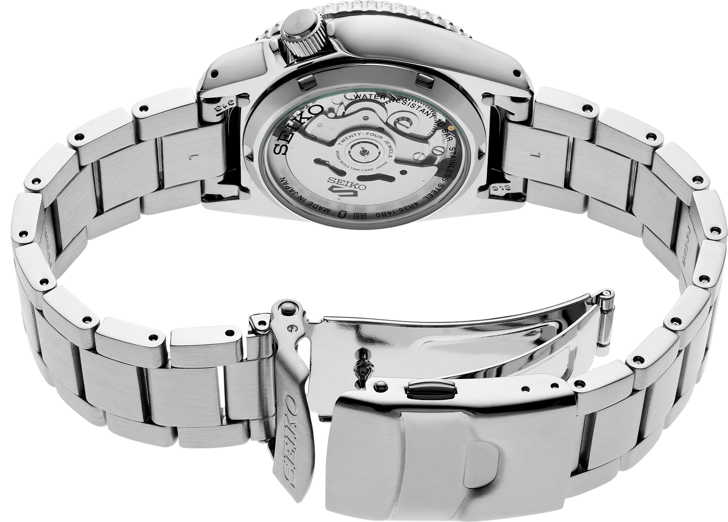 Silver Seiko watch with open caseback on a white background