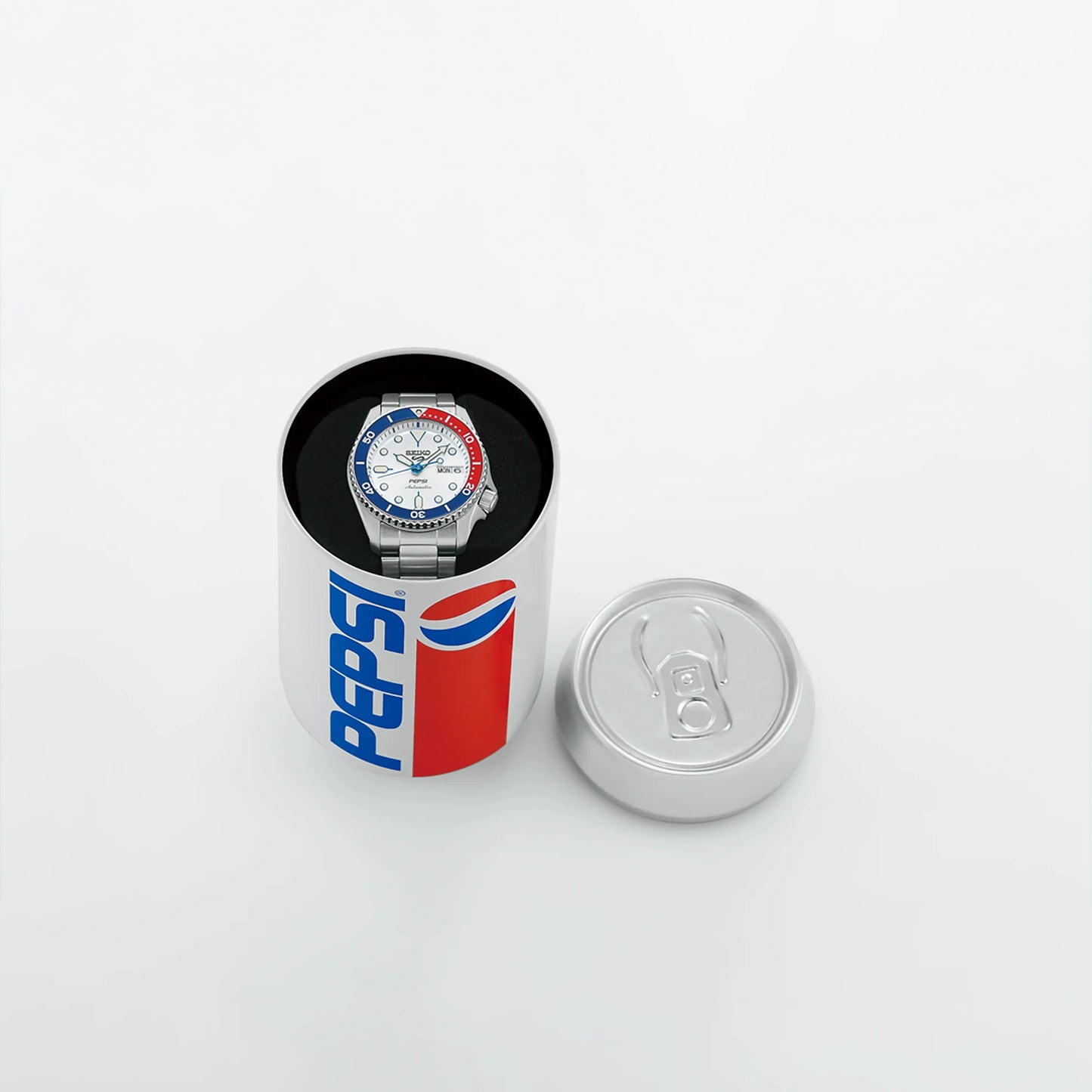 Watch in a Pepsi branded box on a white background