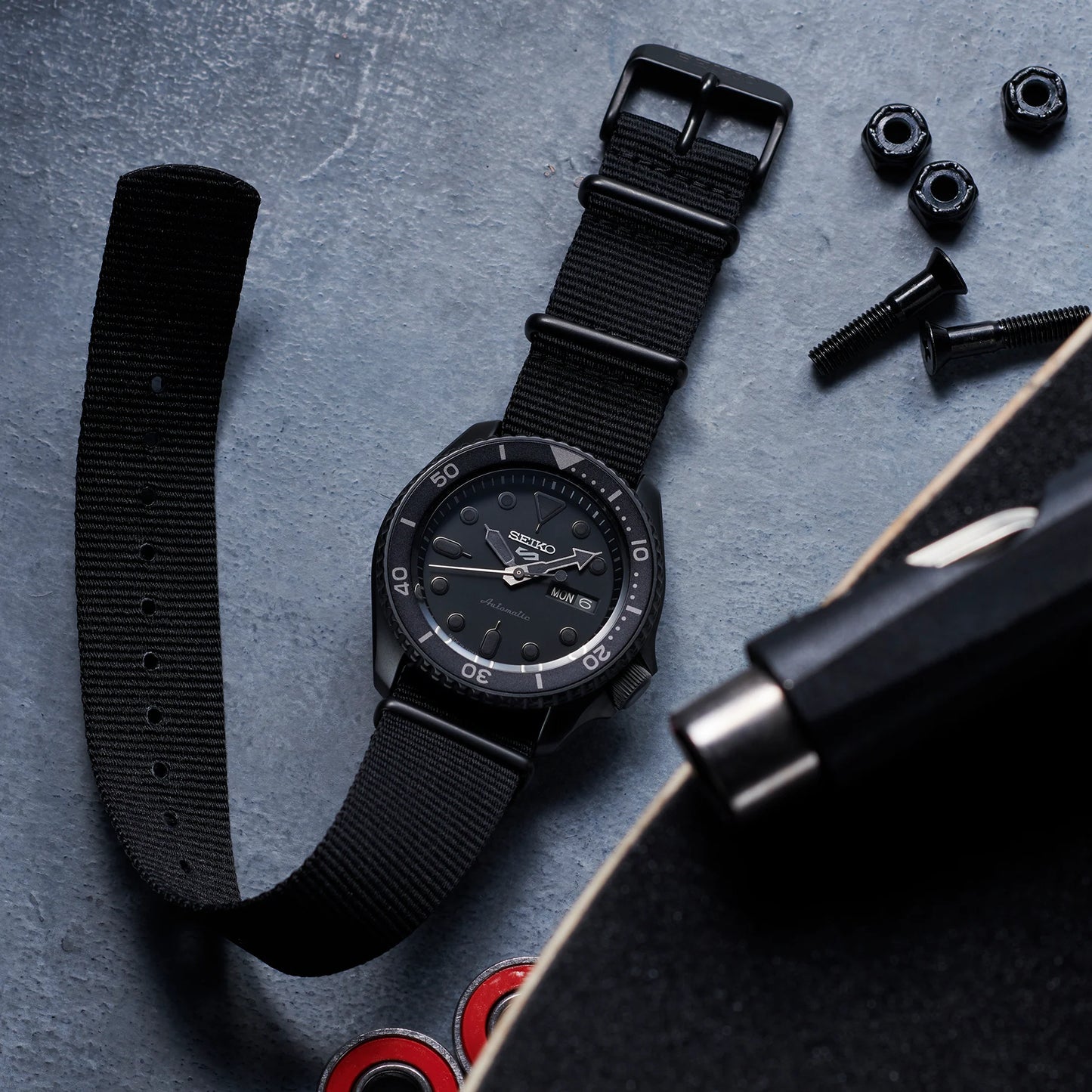 SEIKO 5 Sports SRPD79 Automatic Watch – All-Black Design with Nylon Strap, 42.5mm Case, Day-Date, 100M Water Resistant