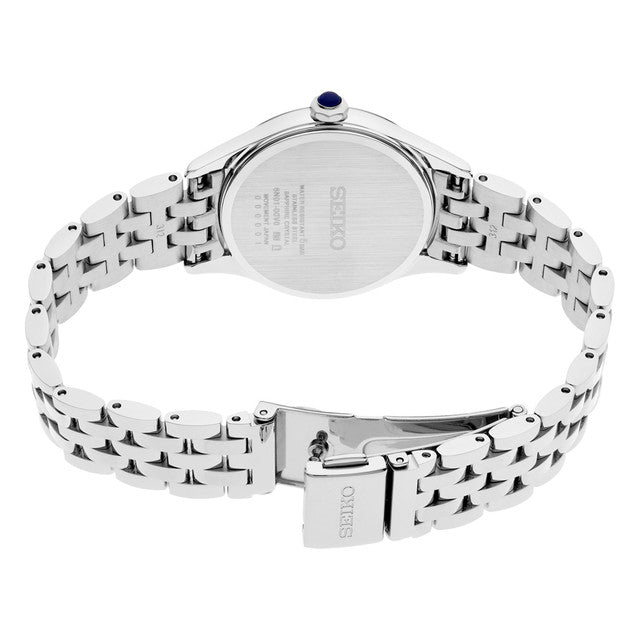 Seiko SUR609 Essentials – stainless steel quartz watch with silver Roman numeral dial, blue hands, sapphire crystal, slim 6.2mm profile, and 50m water resistance.