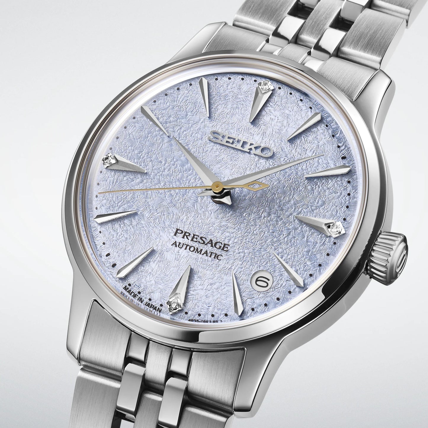SEIKO Presage SRPL61 Cocktail Time – light blue ice-textured dial with four diamonds, stainless steel case and bracelet, automatic movement, and 50m water resistance