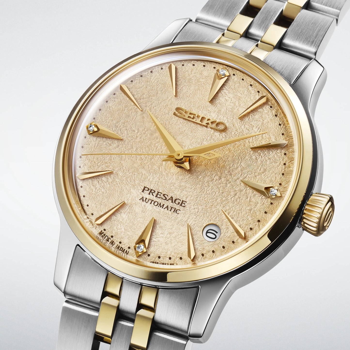 SEIKO Presage SRPL64 Cocktail Time – champagne ice-textured dial with four diamonds, two-tone stainless steel and gold finish, automatic movement, and 50m water resistance