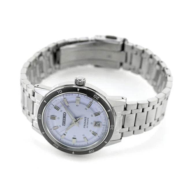 Seiko Presage SRPL73 Style60’s – silver‑violet dial automatic watch inspired by the 1964 Crown Chronograph, with box Hardlex crystal, see‑through caseback, and 41‑hour power reserve.