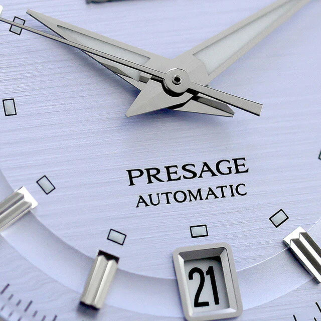 Seiko Presage SRPL73 Style60’s – silver‑violet dial automatic watch inspired by the 1964 Crown Chronograph, with box Hardlex crystal, see‑through caseback, and 41‑hour power reserve.