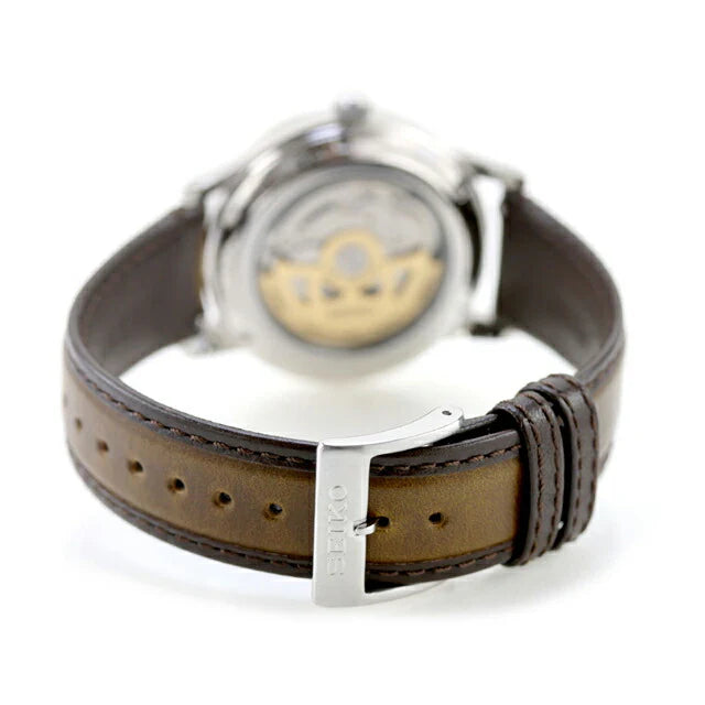 Seiko Presage SRPL75 Style60’s – golden dial automatic watch inspired by 1960s design, with box Hardlex crystal, see‑through caseback, brown leather strap, and 41‑hour power reserve.”