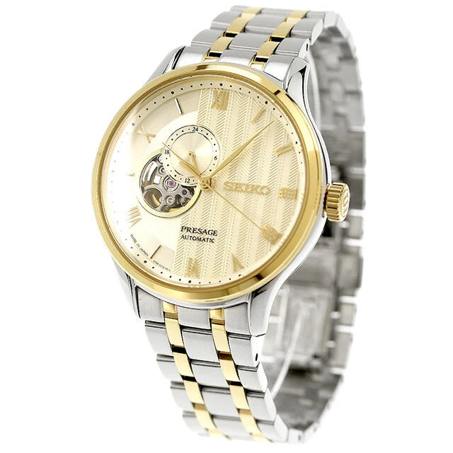 Seiko Presage SSA464 Japanese Garden – ivory-gold dial automatic watch with open-heart display, 24-hour sub-dial, dual-curved sapphire crystal, two-tone bracelet, and see-through caseback.