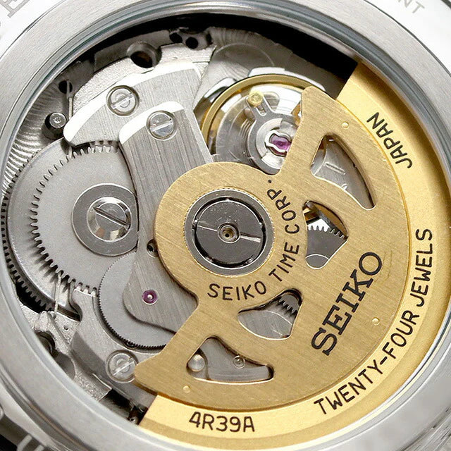 Seiko Presage SSA464 Japanese Garden – ivory-gold dial automatic watch with open-heart display, 24-hour sub-dial, dual-curved sapphire crystal, two-tone bracelet, and see-through caseback.