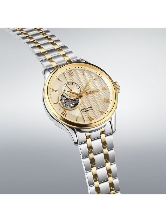 Seiko Presage SSA464 Japanese Garden – ivory-gold dial automatic watch with open-heart display, 24-hour sub-dial, dual-curved sapphire crystal, two-tone bracelet, and see-through caseback.