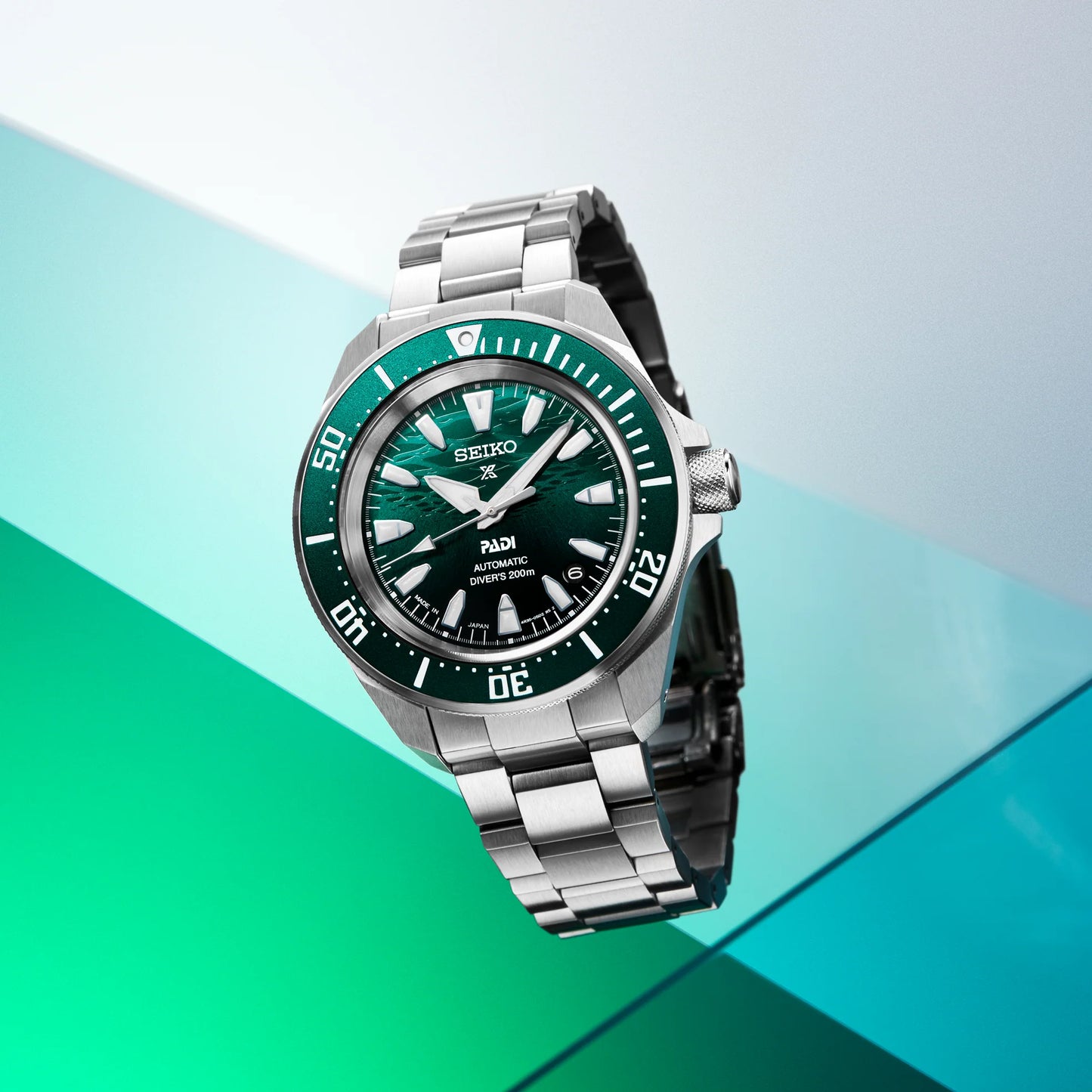 SEIKO Prospex SRPL53 PADI Special Edition – green wave-pattern dial, green rotating bezel, stainless steel bracelet, automatic movement, and ISO-certified 200m water resistance.