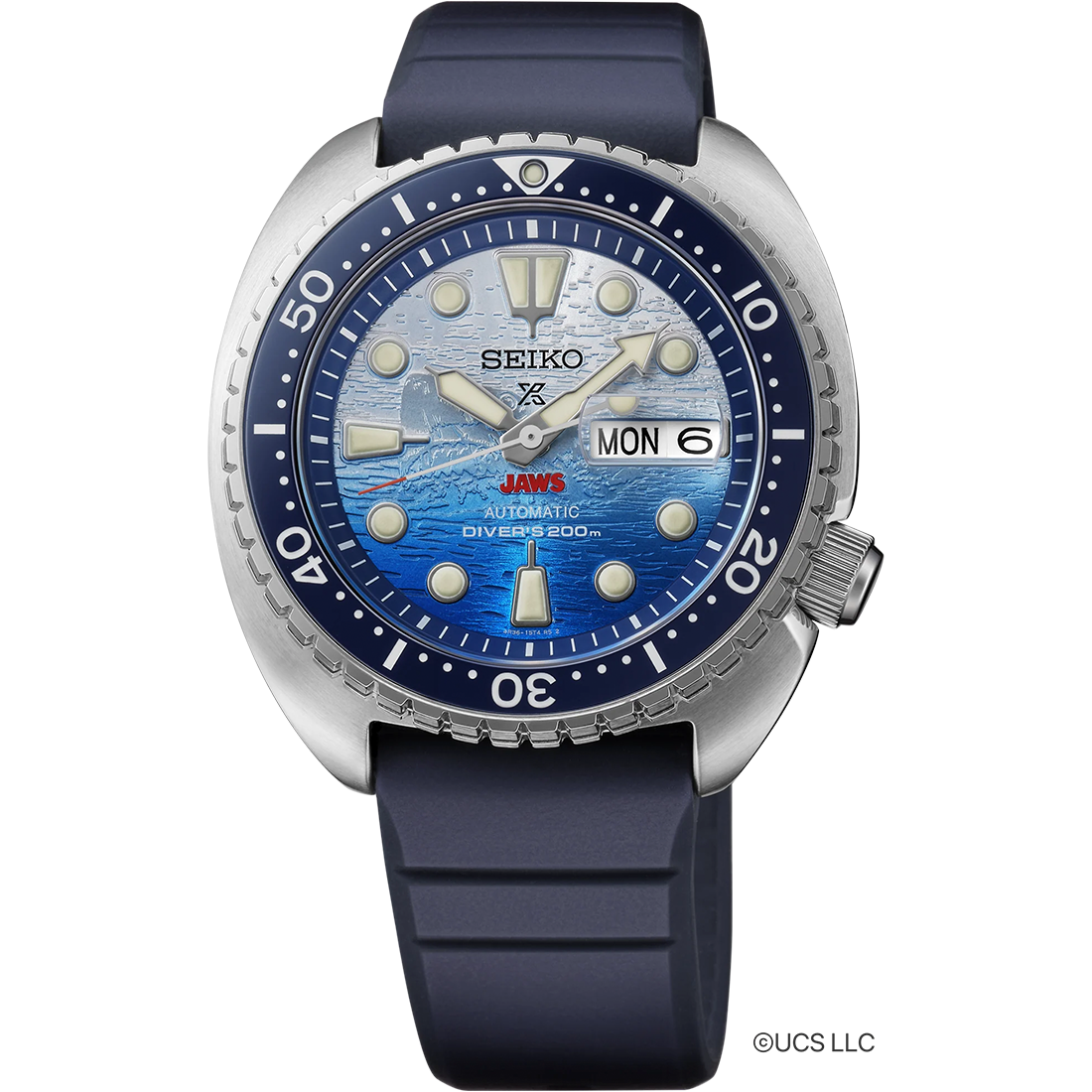 Seiko Prospex SRPL81 JAWS 50th Anniversary Limited Edition diver’s watch with 45 mm stainless steel case, blue ceramic unidirectional bezel, blue and white ombre dial with JAWS logo at 6 o’clock, LumiBrite hands and markers, sapphire crystal, Caliber 4R36 automatic movement, 200m ISO-certified water resistance, blue silicone strap, and engraved caseback featuring Orca boat and shark fin. Limited edition of 5,000 pieces.