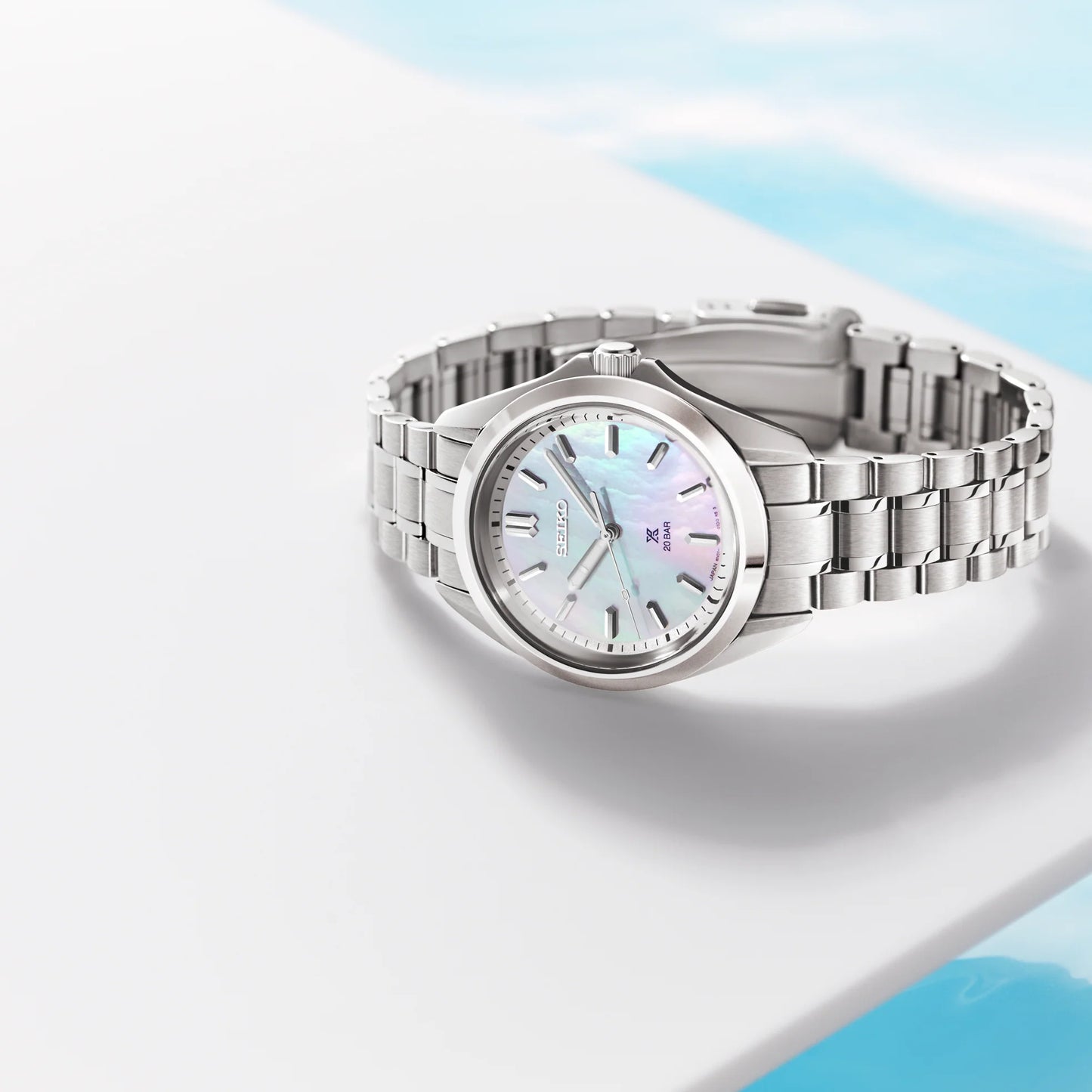 SEIKO Prospex SUR605 Sea Series – 34mm stainless steel case, mother-of-pearl dial, curved sapphire crystal, quartz movement, and 200m water resistance.