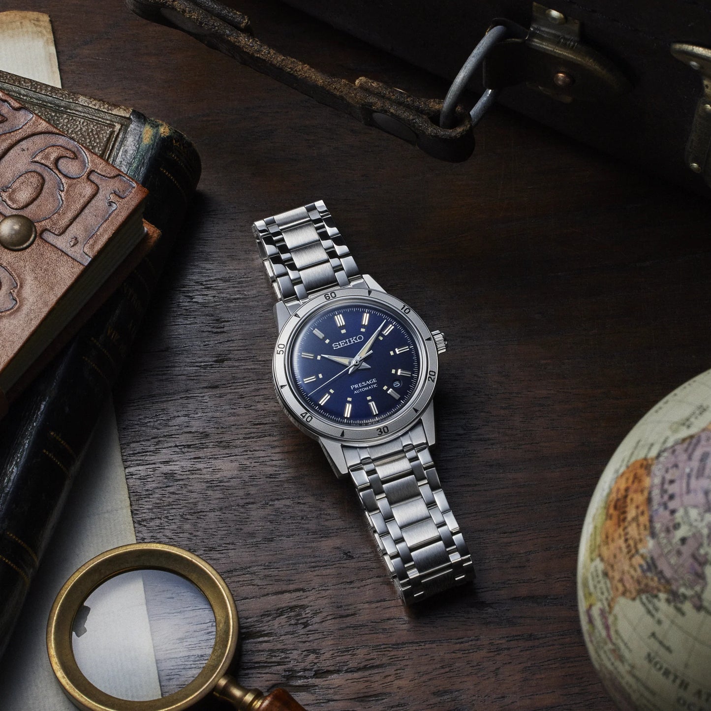 SEIKO SRPL07 from the Presage Style60’s Collection – dark blue sunray dial inspired by vintage work jackets, stainless steel case and bracelet, automatic 23-jewel movement, and 50m water resistance.