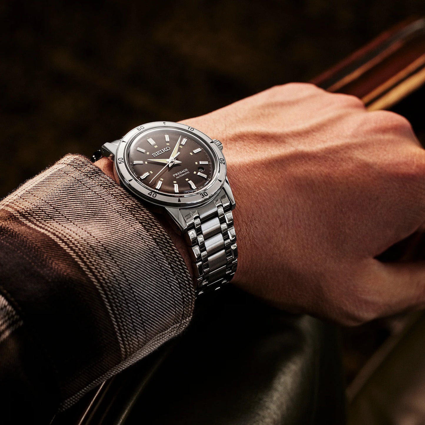 SEIKO SRPL07 from the Presage Style60’s Collection – brown sunray dial, vintage-inspired design, stainless steel bracelet, automatic 23-jewel movement, and 50m water resistance.