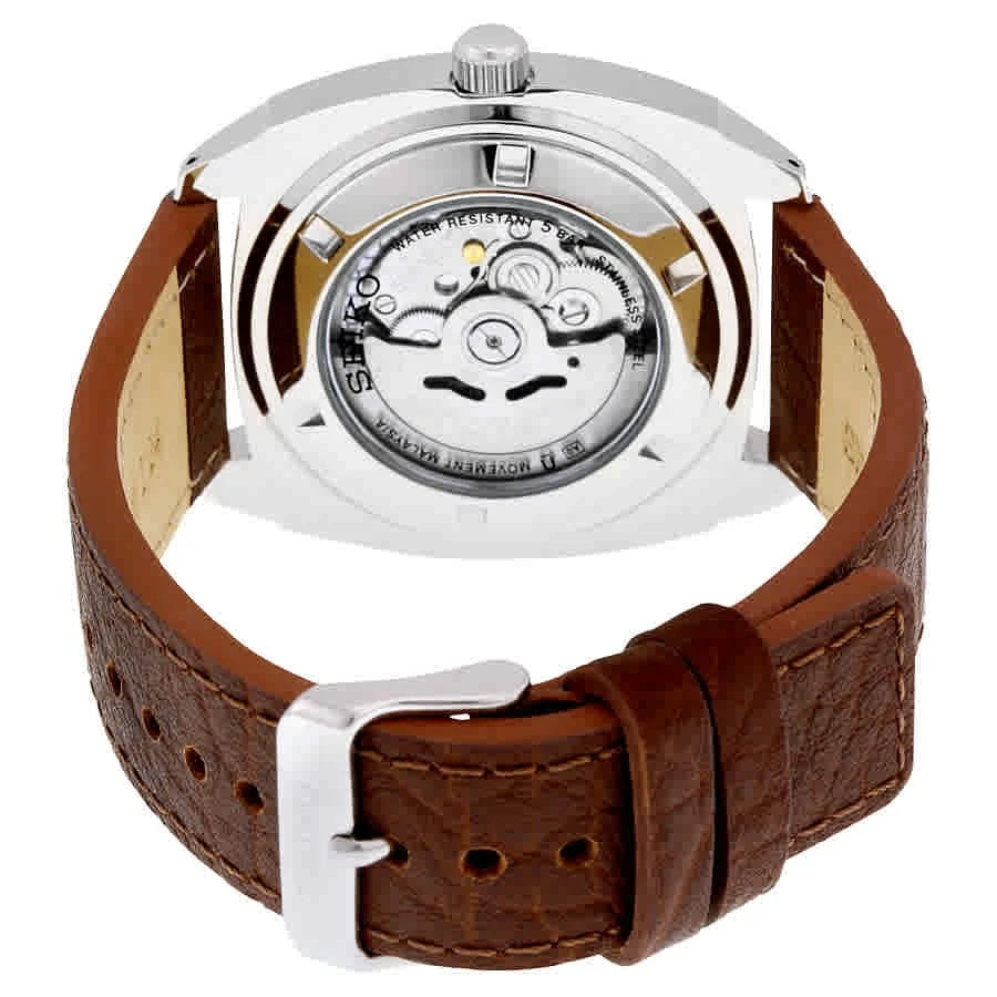 Seiko SNKN37 Recraft – bold blue dial automatic watch with retro cushion-shaped case, brown leather strap, luminous markers, see-through caseback, and 41-hour power reserve.