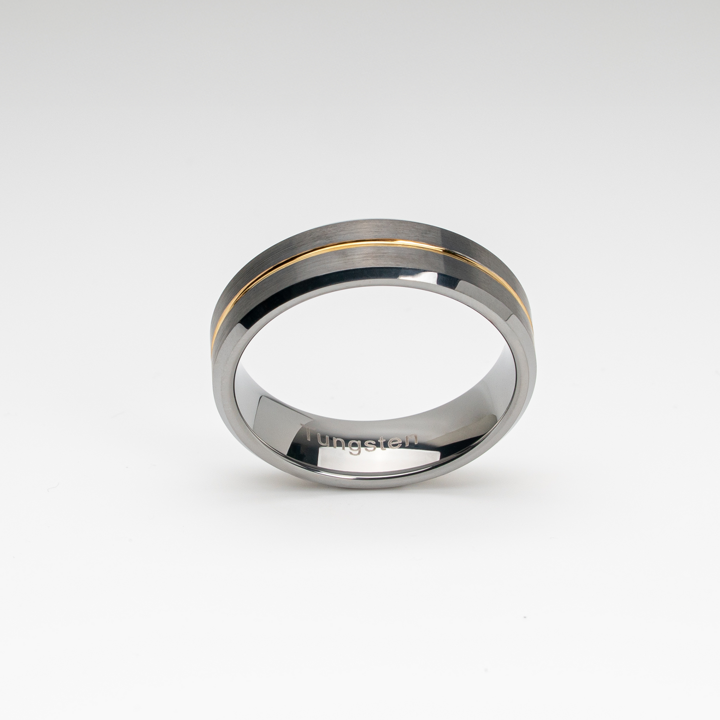 A brushed silver tungsten carbide ring with a polished beveled edge and a gold-tone center groove. Modern two-tone design, durable, scratch-resistant, and comfort fit—ideal as a men’s wedding band, anniversary ring, or stylish fashion accessory.