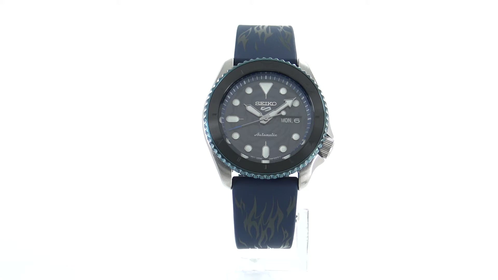 SEIKO 5 Sports One Piece Sabo Limited Edition – black and gray patterned dial with blue accents, blue caseback with Sabo’s logo, black and blue bezel, automatic movement, and 100m water resistance