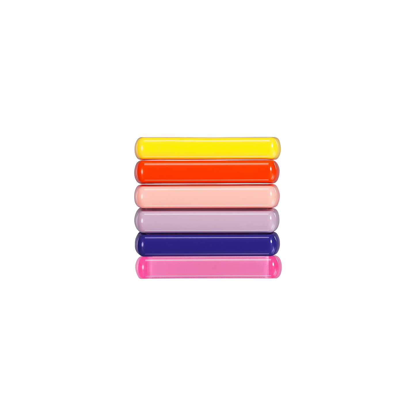 Stack of colorful cylindrical objects on a black background
