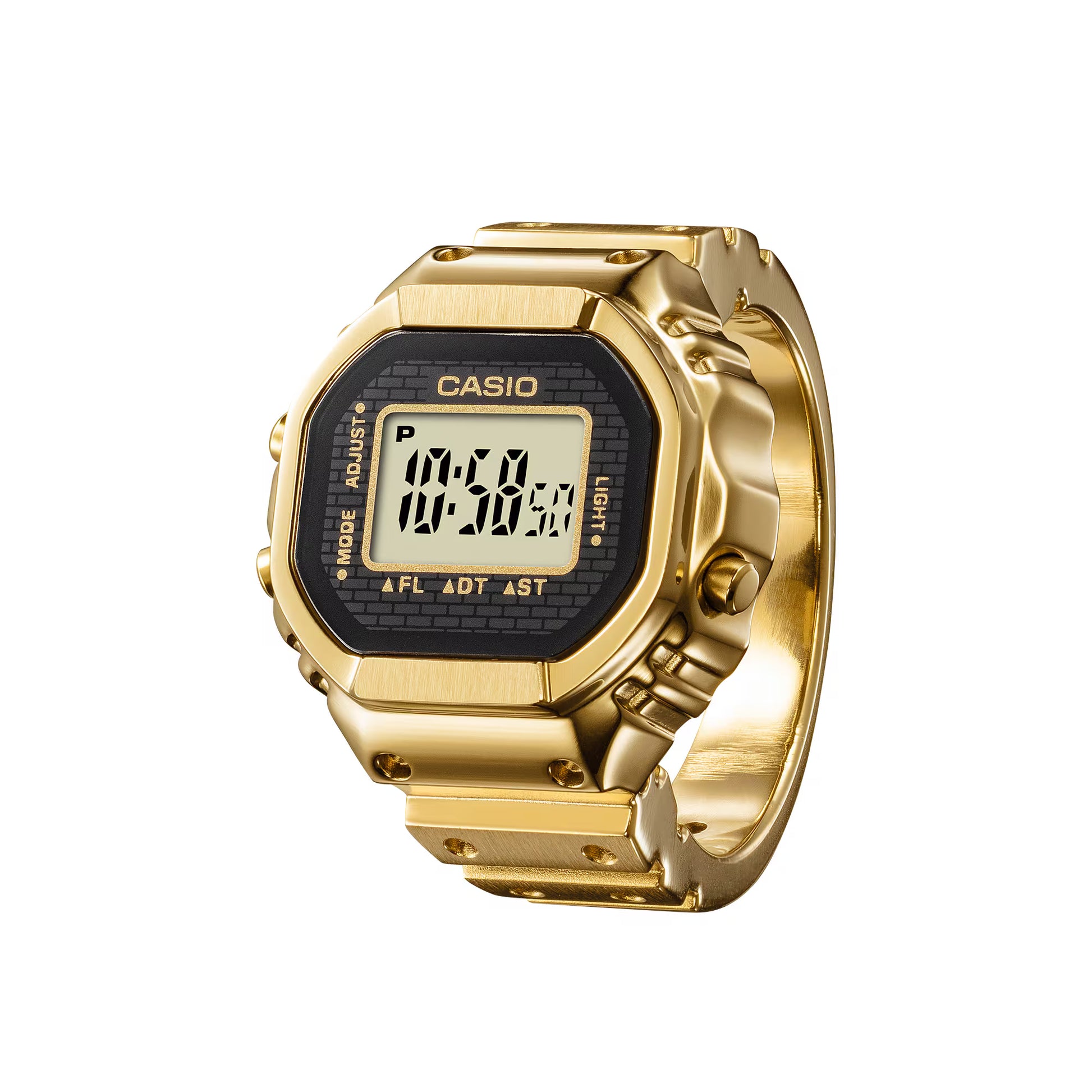 Gold Casio digital watch on a white background