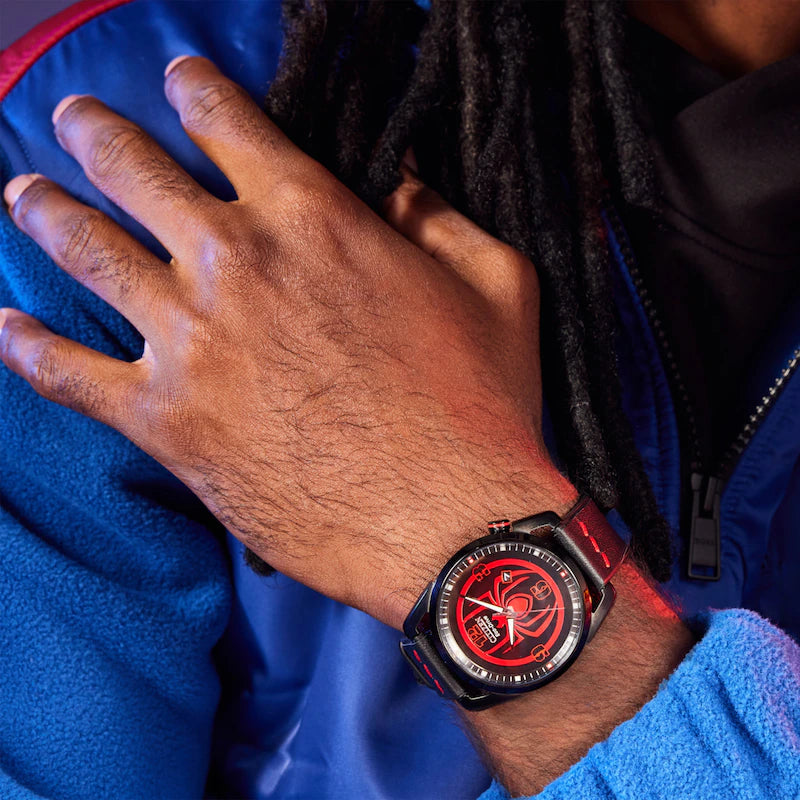CITIZEN MARVEL MILES MORALES AW1685-00W on wrist with black leather strap, red stitching, black stainless steel case, and bold Spider-Man-inspired dial.