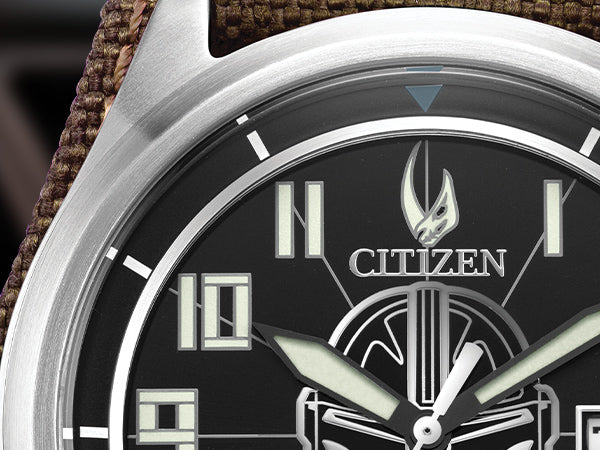 CITIZEN Star Wars Mandalorian AW1411-05W – silver-tone Eco-Drive watch with Mandalorian helmet dial, etched Grogu case back, rugged brown leather strap, and WR200 water resistance.