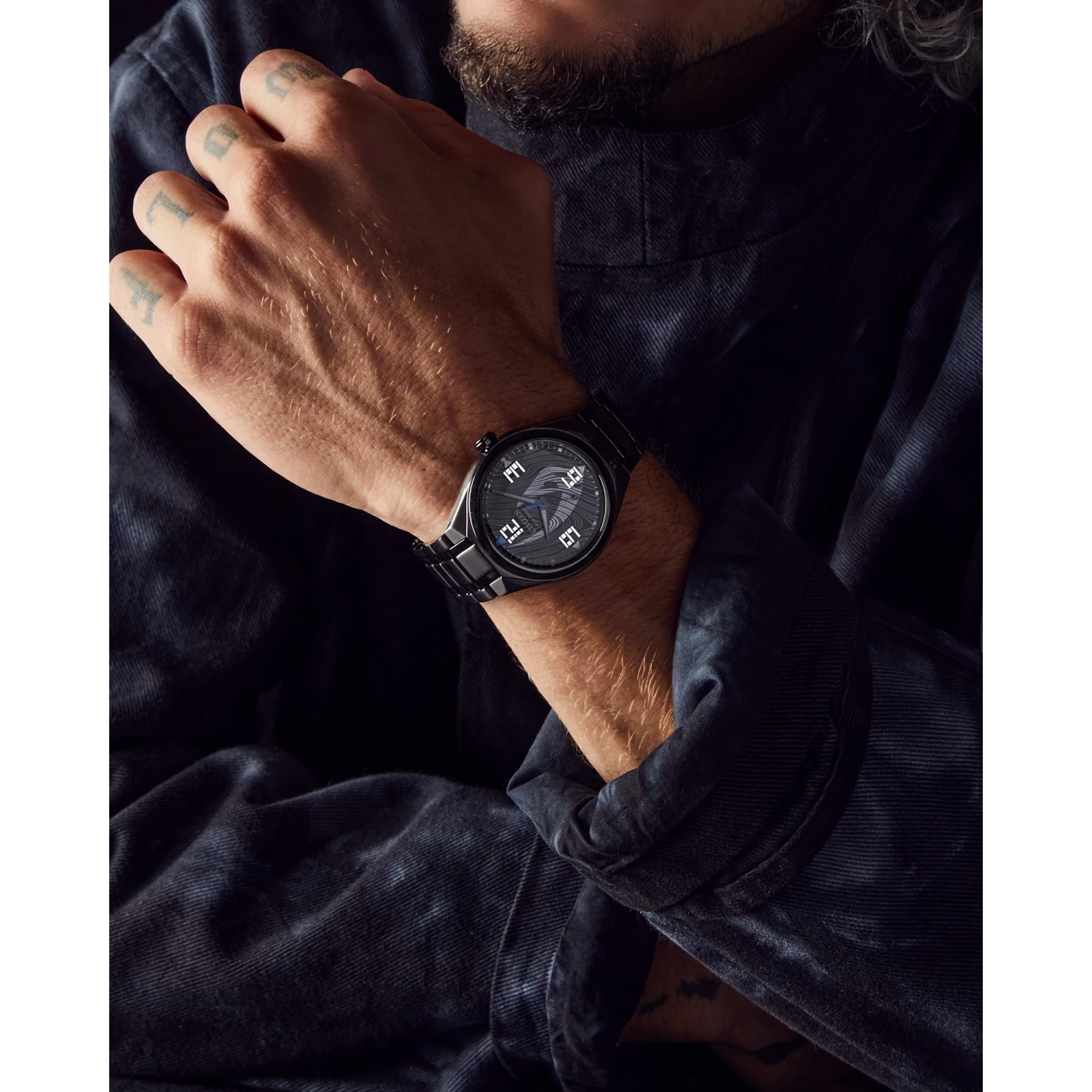 CITIZEN Star Wars Mandalorian AW2045-57W – matte black Eco-Drive watch with Mudhorn signet dial, etched helmet case back, Beskar-inspired bracelet, and WR100 water resistance.