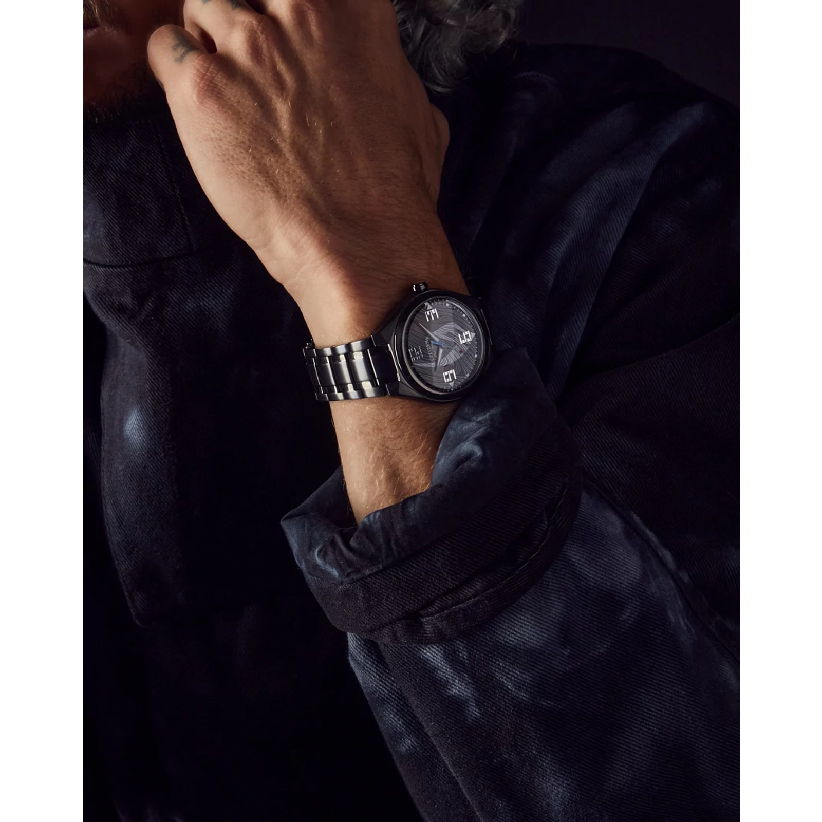 CITIZEN Star Wars Mandalorian AW2045-57W – matte black Eco-Drive watch with Mudhorn signet dial, etched helmet case back, Beskar-inspired bracelet, and WR100 water resistance.