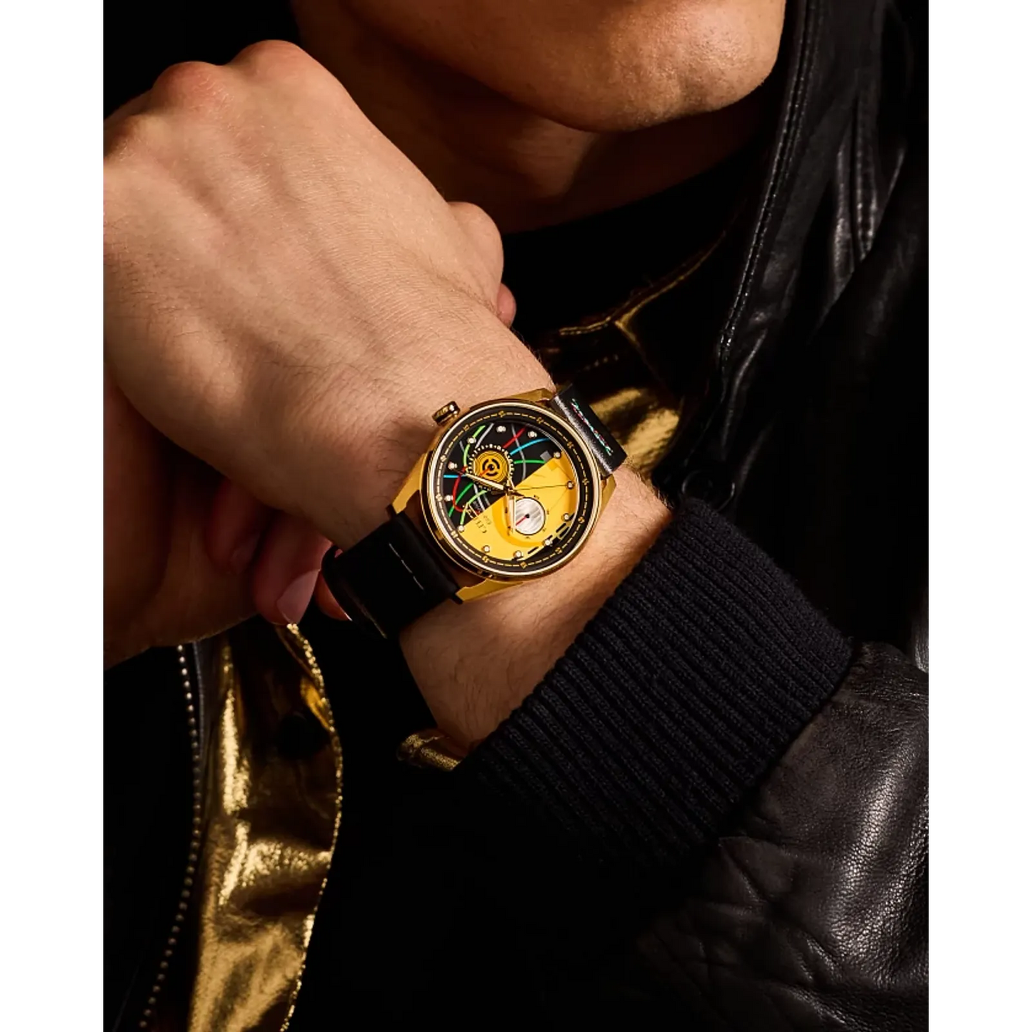 CITIZEN Star Wars C-3PO Rewired BU4026-05W – gold-tone Eco-Drive watch with yellow dial, C-3PO-inspired details, black leather strap with colorful stitching, and WR100 water resistance.